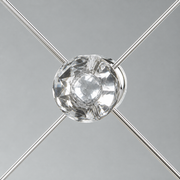 Crystal knob detail | close view of the faceted clear knob and silver diagonal trim