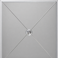 Mirrored glass detail | close view of beveled silver trim and diagonal panel lines