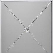 Mirrored glass detail | close view of beveled silver trim and diagonal panel lines