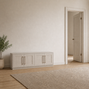 Scale | low Alder White TV stand beside a complete floor-to-ceiling interior doorway