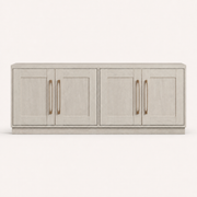 Front | straight-on studio view of the Alder White TV stand with four recessed-panel doors and four antique-brass pulls