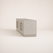Side | strong studio profile showing the plain side panel, cabinet depth, top overhang, front edge, and plinth base