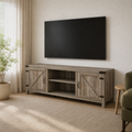 Living room angle | Gray-washed barn-door TV stand viewed from the right beneath a wall-mounted television