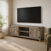 Living room angle | Gray-washed barn-door TV stand viewed from the right beneath a wall-mounted television