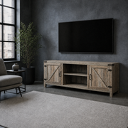 Loft living room | Gray-washed barn-door TV stand below a wall-mounted television in a charcoal loft