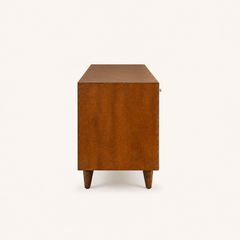 Studio | right side profile of the mahogany cherry TV stand showing the full depth, solid side panel, top, and tapered legs