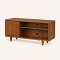 Studio | three-quarter mahogany cherry TV stand showing its right side panel, top, open shelves, cable ports, and tapered legs