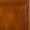 Close-up | glossy mahogany cherry wood surface with visible natural grain