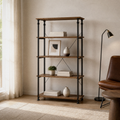 In a room | rustic oak and black metal etagere styled with books and ceramics in a warm white study