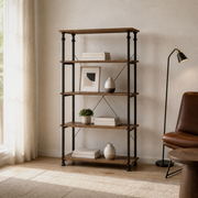 In a room | rustic oak and black metal etagere styled with books and ceramics in a warm white study