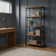 Blue-gray office | etagere styled with books and archival boxes under cool clerestory light