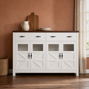 Second room | same sideboard against a muted clay-terracotta wall, warm afternoon light from the right