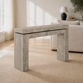Living room angle | Weathered Wheat solid-pine console table from a three-quarter view with its thick top and block legs