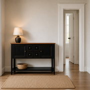 Scale | black console beside a full-height doorway in a foyer to show its 34 inch height and room scale