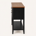 Side | right-side studio profile showing the console depth, black side panel, legs, and lower shelf