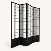 Angle | four-panel black shoji room divider in a strong three-quarter studio view