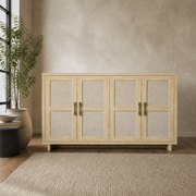 Warm taupe room | pale natural oak four-door sideboard with woven linen panels beside a black-framed window