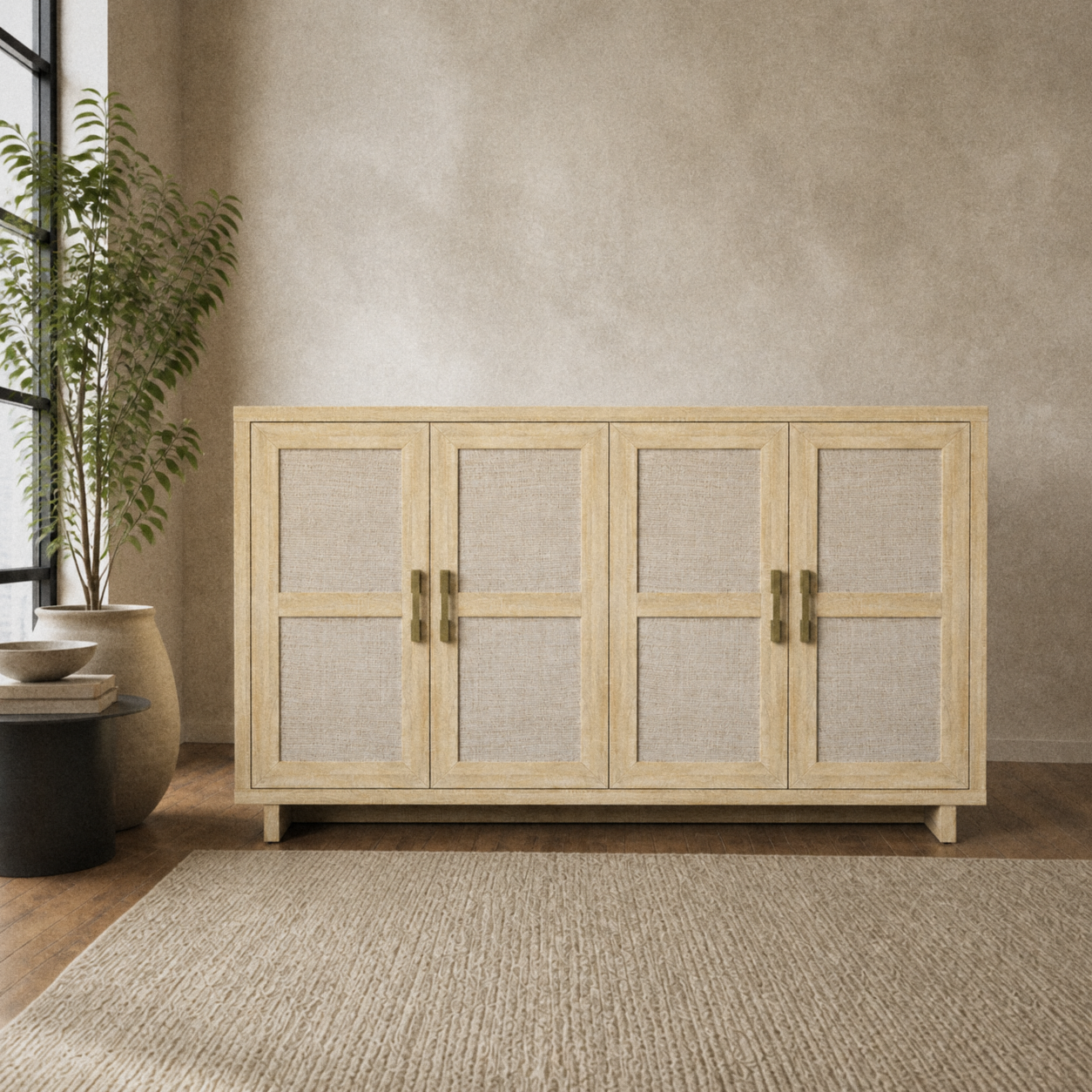 Warm taupe room | pale natural oak four-door sideboard with woven linen panels beside a black-framed window