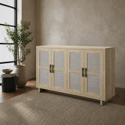Warm room angle | pale natural oak four-door sideboard from a right three-quarter beside a black-framed window