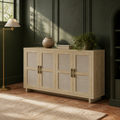 Deep green room | pale natural oak sideboard on terracotta tile with warm window light across its woven doors