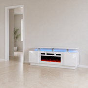 Scale | high-gloss white fireplace TV stand beside a full-height interior doorway for scale, with blue-lit bay and chrome posts