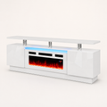 Studio | three-quarter studio view of the high-gloss white fireplace TV stand showing side cabinet depth, upper shelf, blue-lit bay and three chrome posts