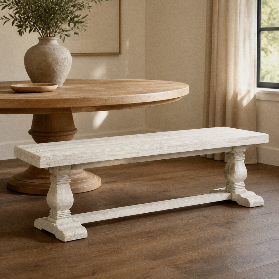In a room | the bench in a warm plaster dining room, low golden late-afternoon sidelight from the right; table is styling only