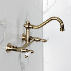 Wall Mount Bathroom Faucet, Heirloom, Double Handle in Antique Brass