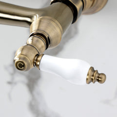 Wall Mount Bathroom Faucet, Heirloom, Double Handle in Antique Brass