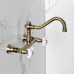 Wall Mount Bathroom Faucet, Heirloom, Double Handle in Antique Brass