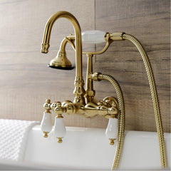 Wall Mount Clawfoot Tub Faucet, Heirloom, Three-Handle with Hand Shower in Brushed Brass
