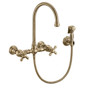 Wall Mount Kitchen Faucet with Gooseneck Spout and Side Spray in Antique Brass