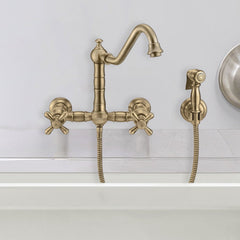 Wall Mount Kitchen Faucet with Swivel Spout and Side Spray in Antique Brass