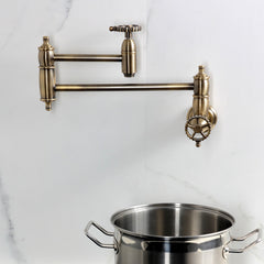 Wall Mount Pot Filler Faucet, Tulare, Two-Handle in Antique Brass