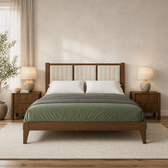 Room 1 | Straight-on bedroom view of the walnut wood bed with a channel-tufted light neutral headboard, white bedding, nightstands, lamps, and a rug