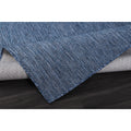 Folded corner | one corner turned back to show the backing and weave