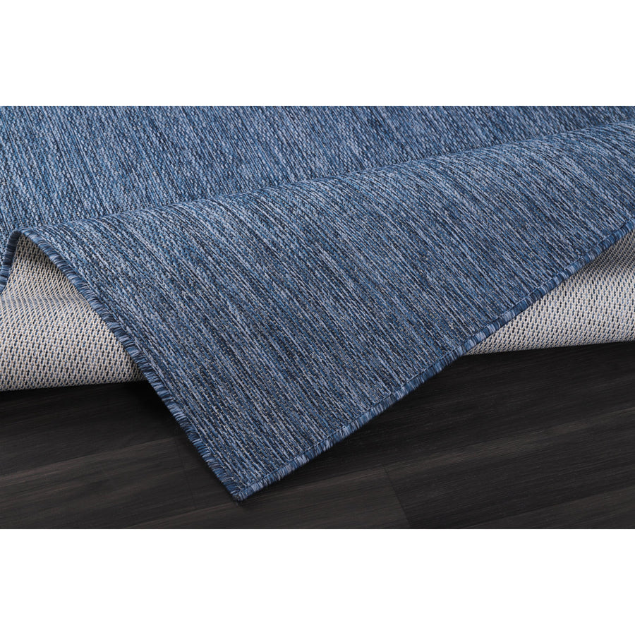 Folded corner | one corner turned back to show the backing and weave