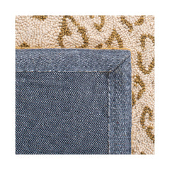 Wool Area Rug in Ivory and Beige with Animal Print