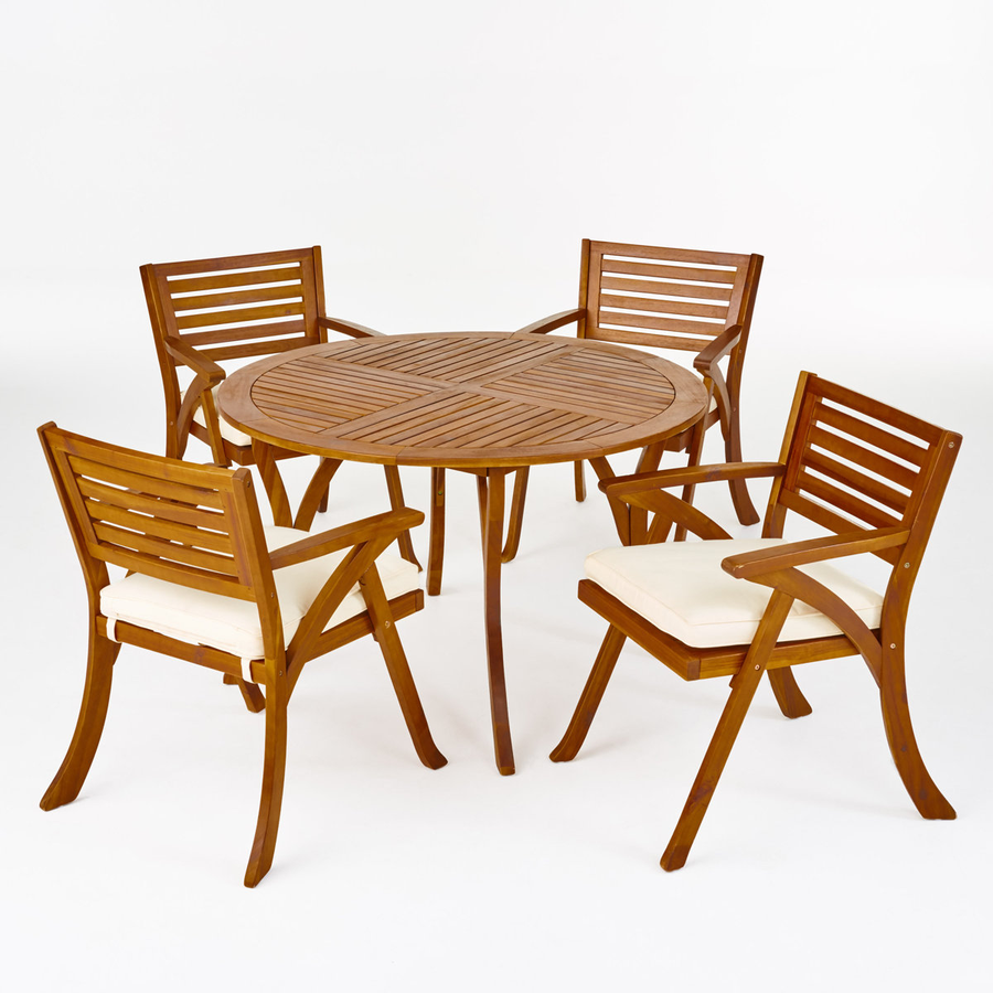 Front | round acacia table and four chairs on paper studio ground, all five pieces shown
