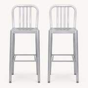Front | two silver bar stools side by side, front elevation on paper studio ground