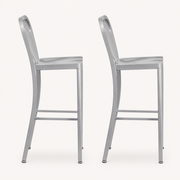 Profile | both stools in true side profile on paper ground, staggered so each is fully visible