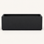 Studio front | empty matte charcoal-black rectangular composite trough planter with a narrow rim and recessed plinth