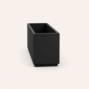 Studio side | empty matte charcoal-black composite trough planter showing its 17 inch end depth and open cavity