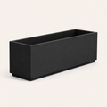 Studio angle | empty matte charcoal-black composite trough planter showing its long face, short end, and open cavity