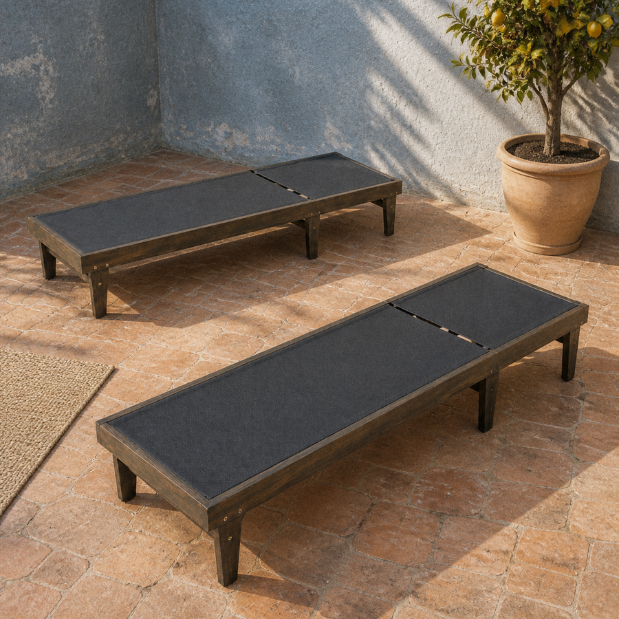 Courtyard | two flat mesh chaise lounges on terracotta tile
