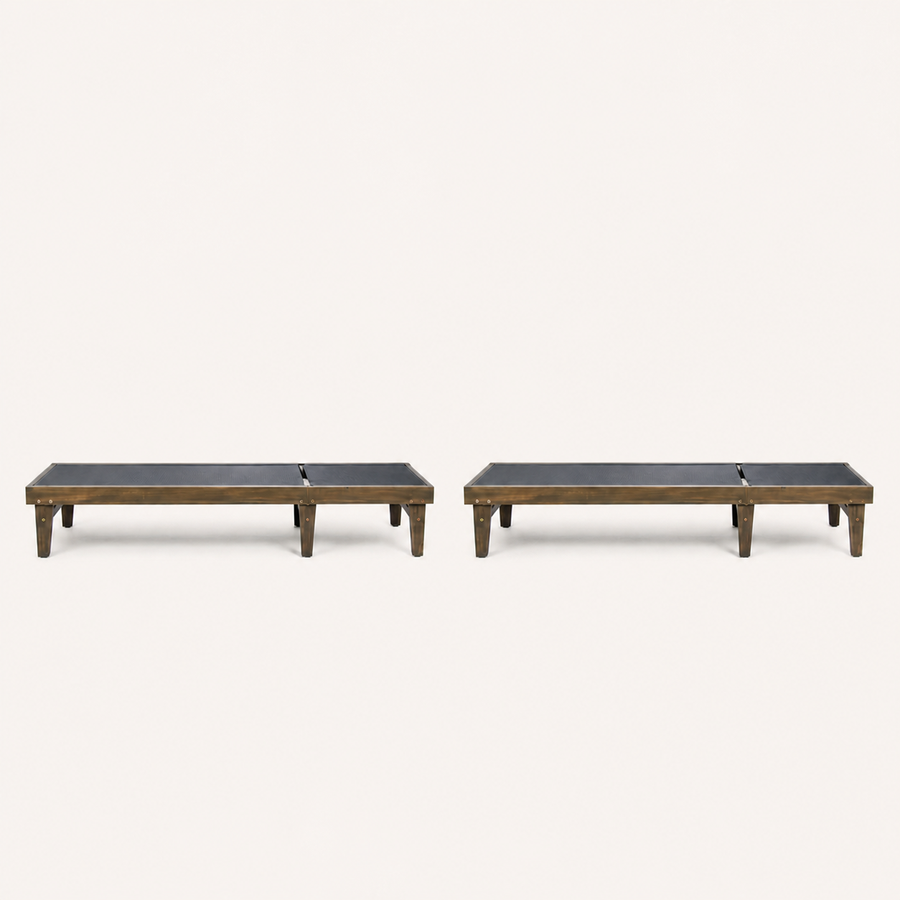Studio front | two flat charcoal mesh chaise lounges with gray-washed acacia frames