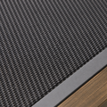 Mesh close-up | charcoal woven sling with gray metal edge and acacia rail