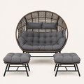 Studio front | Straight-on view of the complete double egg chair and two ottomans with charcoal-gray cushions