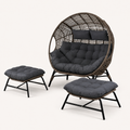 Studio angle | Right three-quarter view showing the oval rattan basket depth and both ottomans