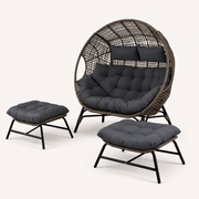 Studio angle | Right three-quarter view showing the oval rattan basket depth and both ottomans